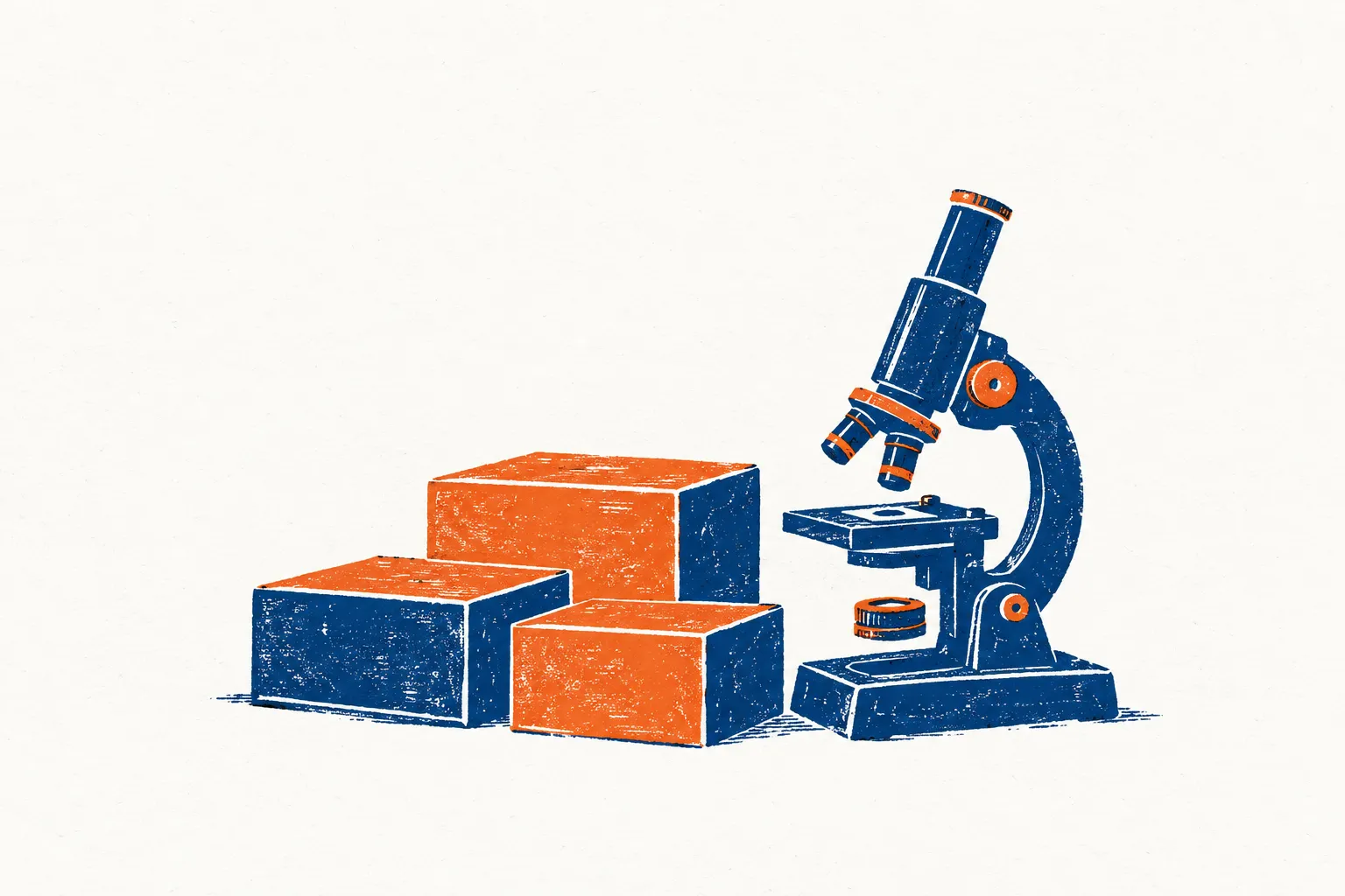 Dozen met medische benodigdheden naast een microscoop